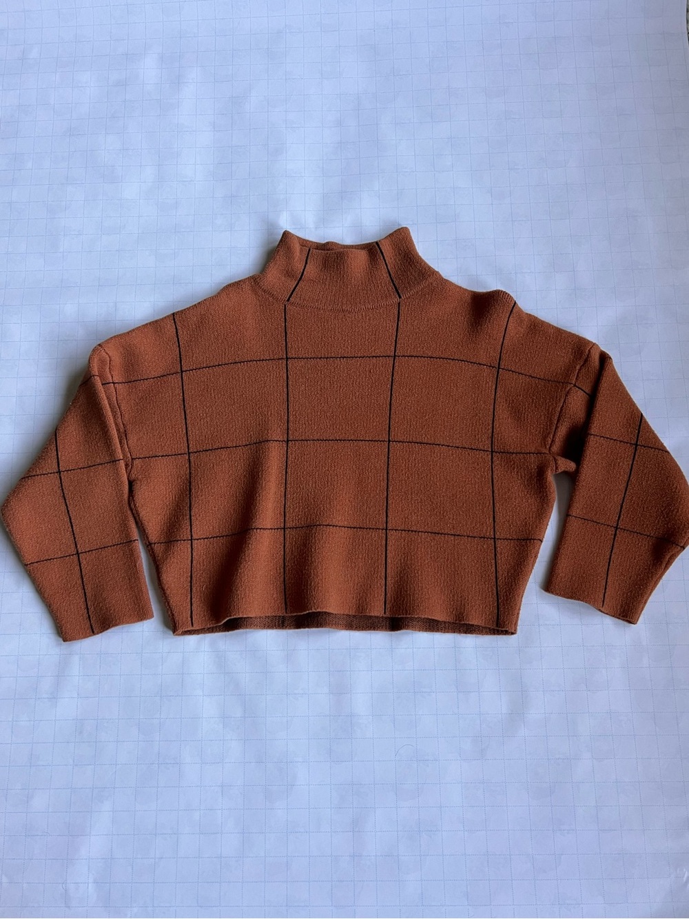 Womenโs Rust Grid Mock Neck Sweater
